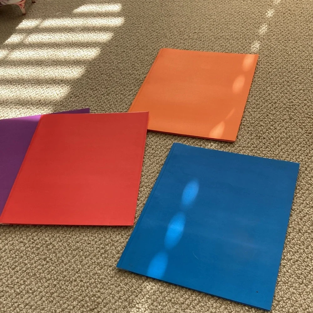 Unison 2 Pocket 3 Prong Folders Set of Four Assorted Colors With Dividers 4 Pack